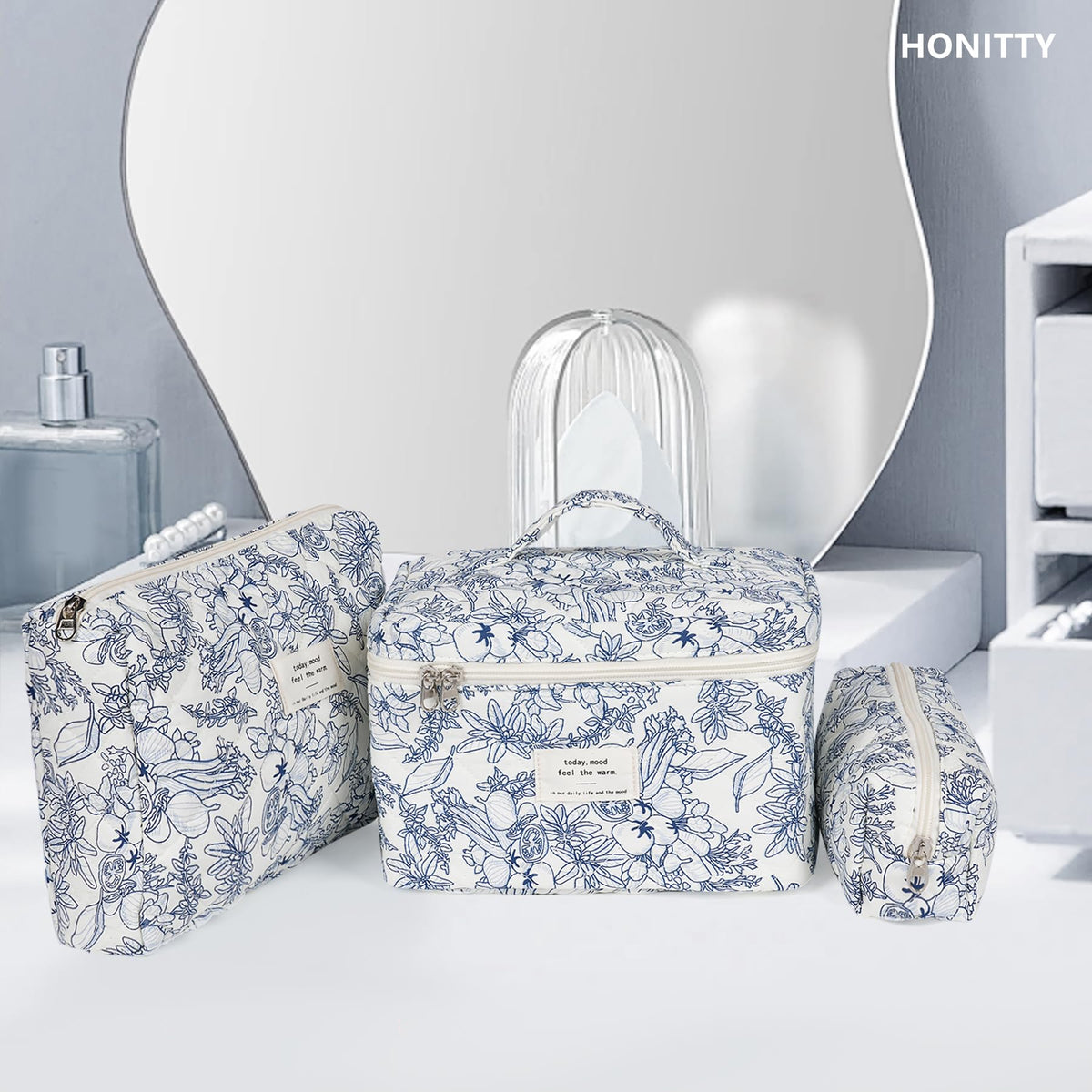 honitty floral cosmetic bag on a dresser