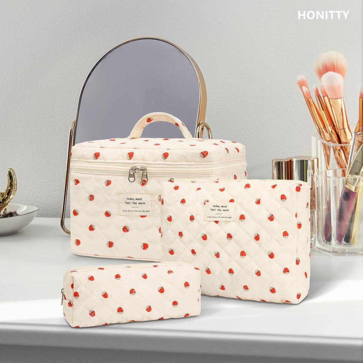 honitty Floral Makeup Bag Set in a suitcase