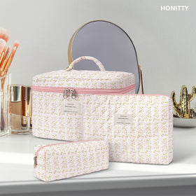 honitty Floral Makeup Bag Set on a dresser