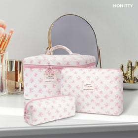 honitty floral makeup bag set on dresser