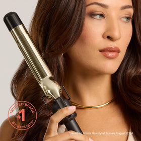 HOT TOOLS 24K Gold Curling Iron in use on long hair
