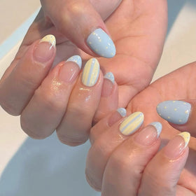 HPYFOI Short Almond Press On Nails light blue and yellow design front view