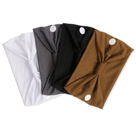 Huachi headband on a table with a mask hanging from buttons