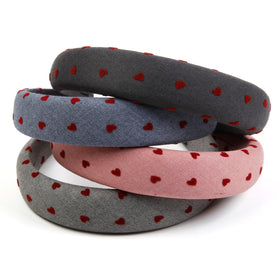 Huachi Valentine's Day headband in pink colour on a model