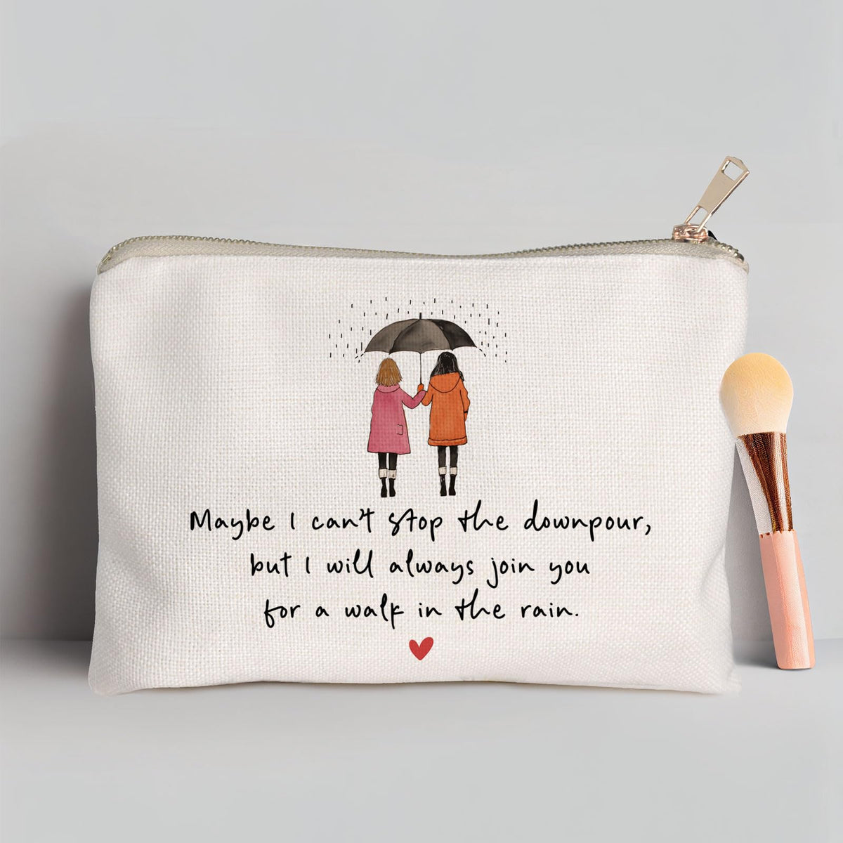 HubbgDesign cosmetic bag open with makeup items inside