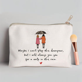 HubbgDesign cosmetic bag open with makeup items inside