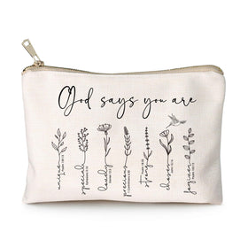 HubbgDesign God Says You Are Makeup Bag front view with floral design