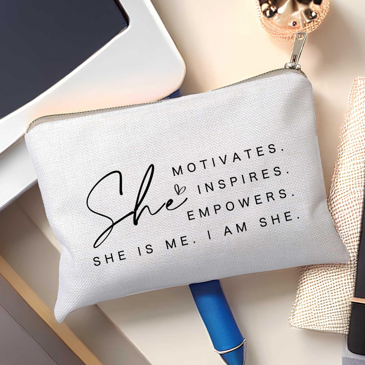 HubbgDesign Motivational Cosmetic Bag in use as a travel accessory