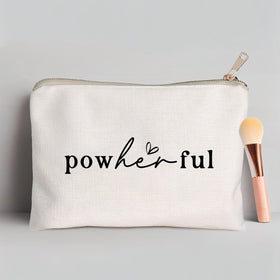 HubbgDesign Women Empowerment Cosmetic Bag in use in a car