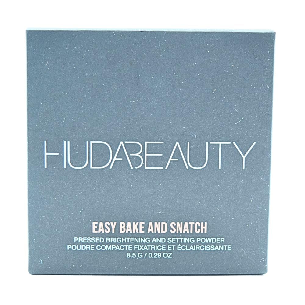 Huda Easy Bake Powder Cherry Blossom on a makeup table