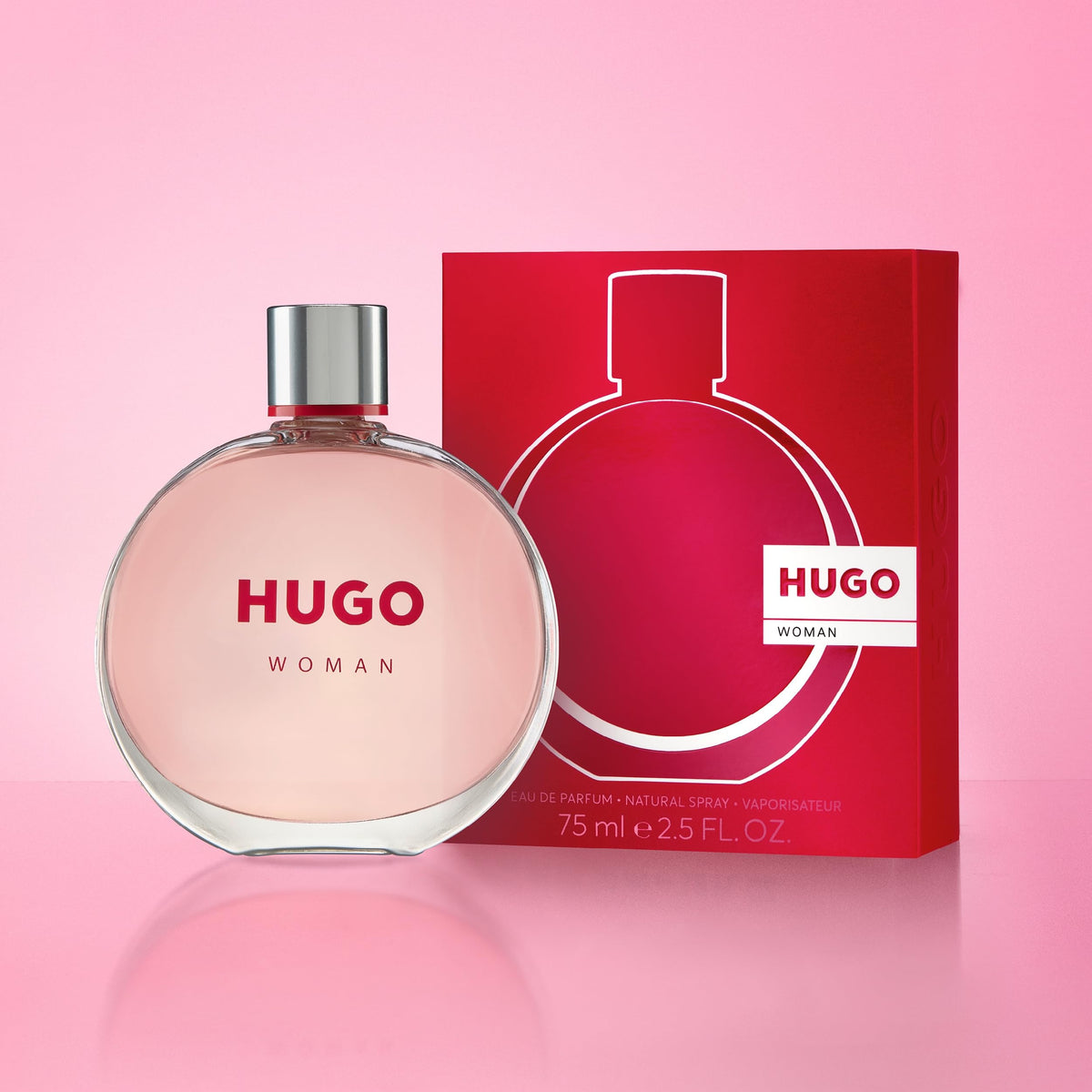 Hugo Boss Deep Red Eau de Parfum with floral background