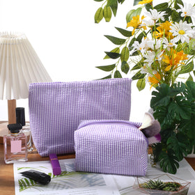 Huhumy makeup bag set displayed with beauty products