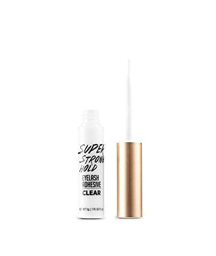 iENVY eyelash adhesive with applicator on a hand