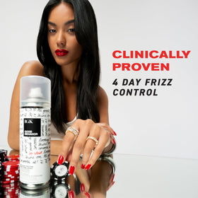 IGK Good Behavior Smoothing Spray 12 oz in use on hair