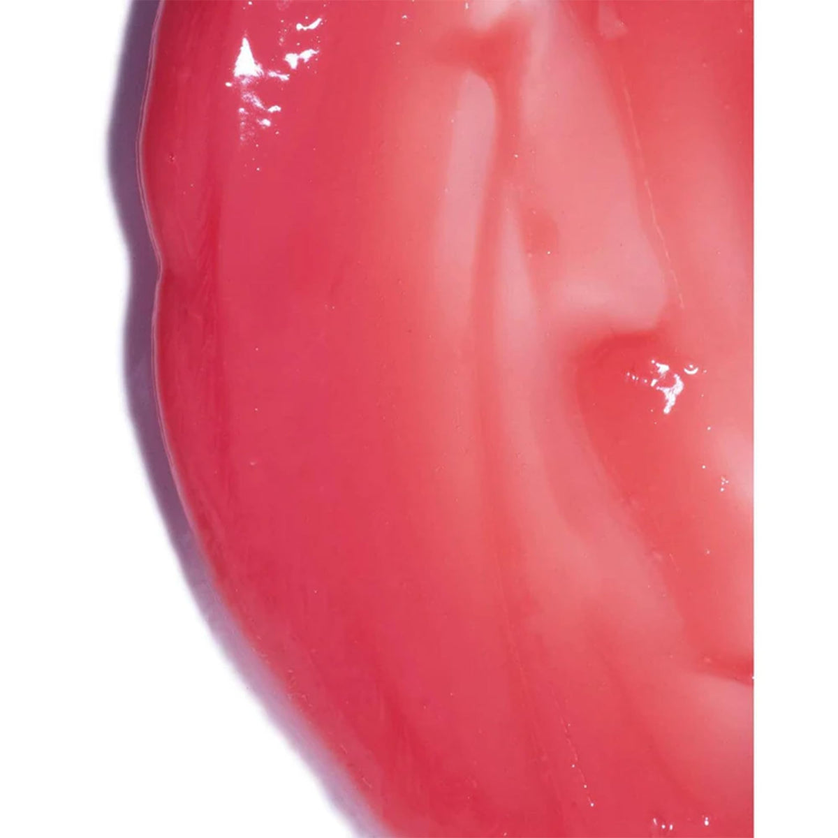 IGK Strawberry Milkshake Hair Gloss mask in a bathroom setting