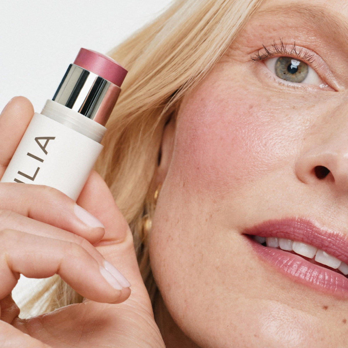 ILIA Multi-Stick Cheek + Lip Colour in a makeup bag