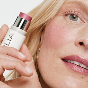 ILIA Multi-Stick Cheek + Lip Colour in a makeup bag