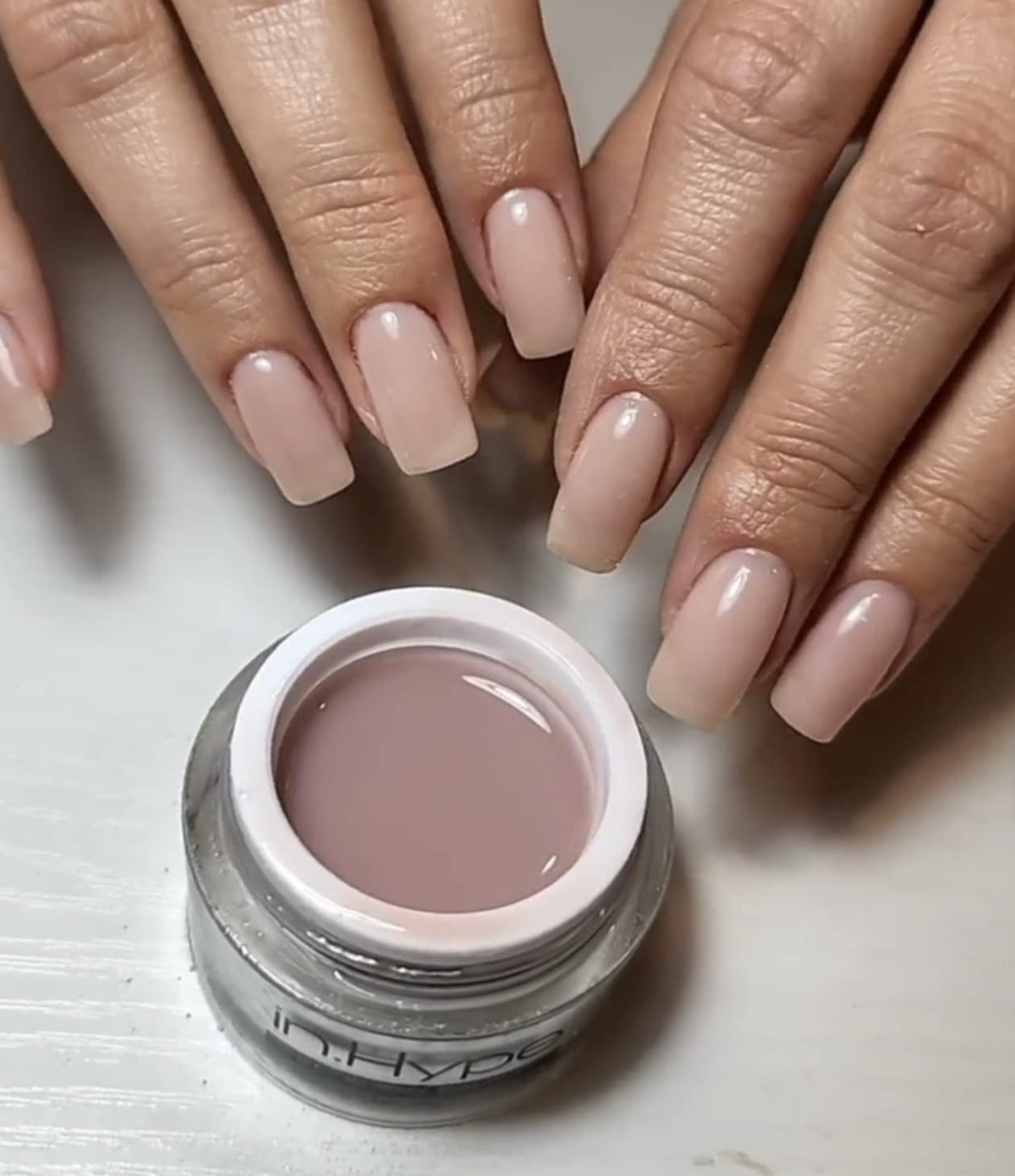 IN.HYPE Camouflage Builder Gel Cool Nude #32 on a nail art display