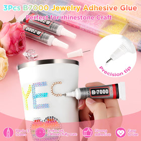 Included B7000 glue and tweezers from Zefy rhinestone kit