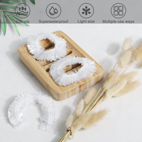 Individual Ceizioes disposable shower cap laid flat