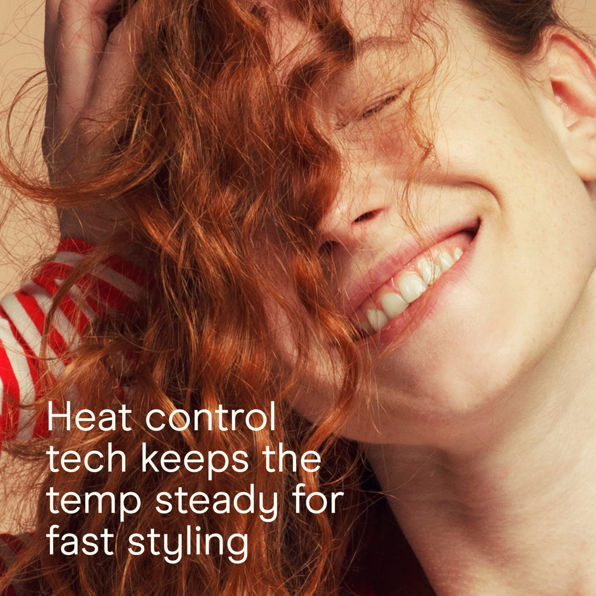 INFINITIPRO BY CONAIR Curling Wand in use creating waves
