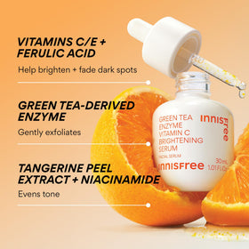 innisfree Green Tea Enzyme Vitamin C Serum with fresh green tea leaves
