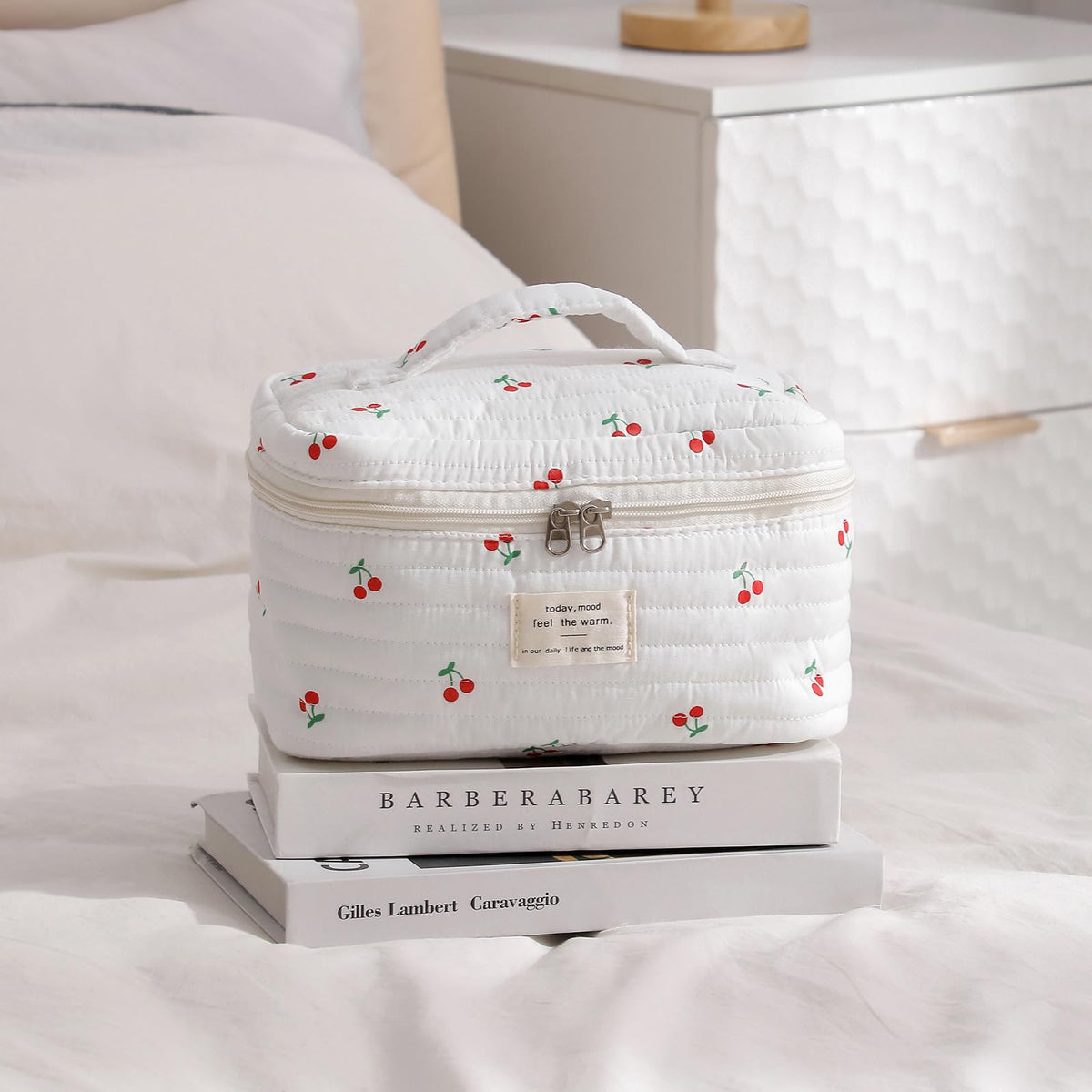 Inside of uekeboag Large Travel Quilted Makeup Bag with cosmetics