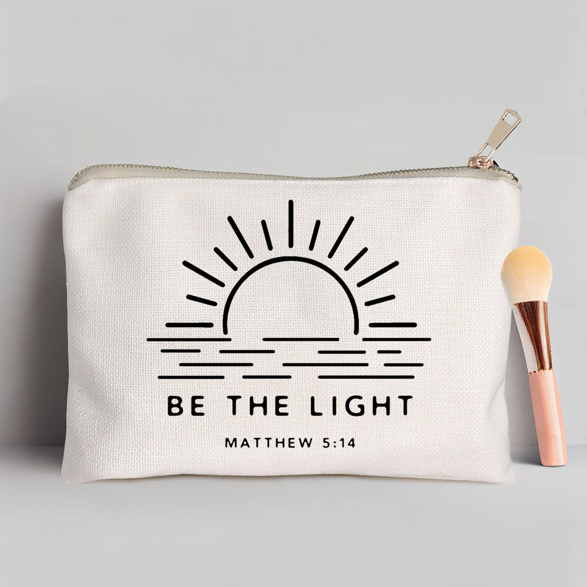 Inside view of HubbgDesign Be The Light makeup bag showing storage space