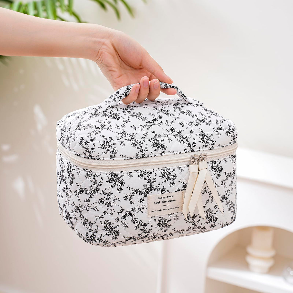 Inside view of uekeboag Large Travel Quilted Makeup Bag with cosmetics
