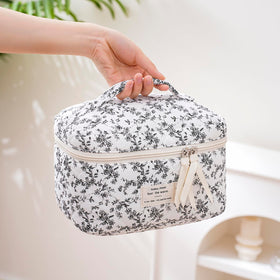 Inside view of uekeboag Large Travel Quilted Makeup Bag with cosmetics