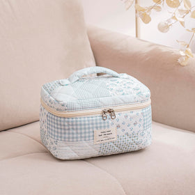 Inside view of uekeboag Large Travel Quilted Makeup Bag with cosmetics