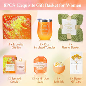 Insulated mug and candle included in the BodyRefresh gift basket