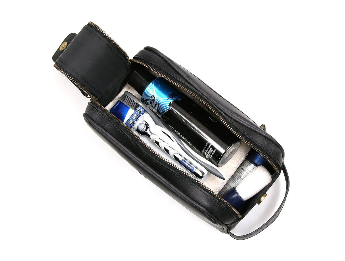 Interior of AARON LEATHER GOODS leather toiletry pouch showing spacious compartment