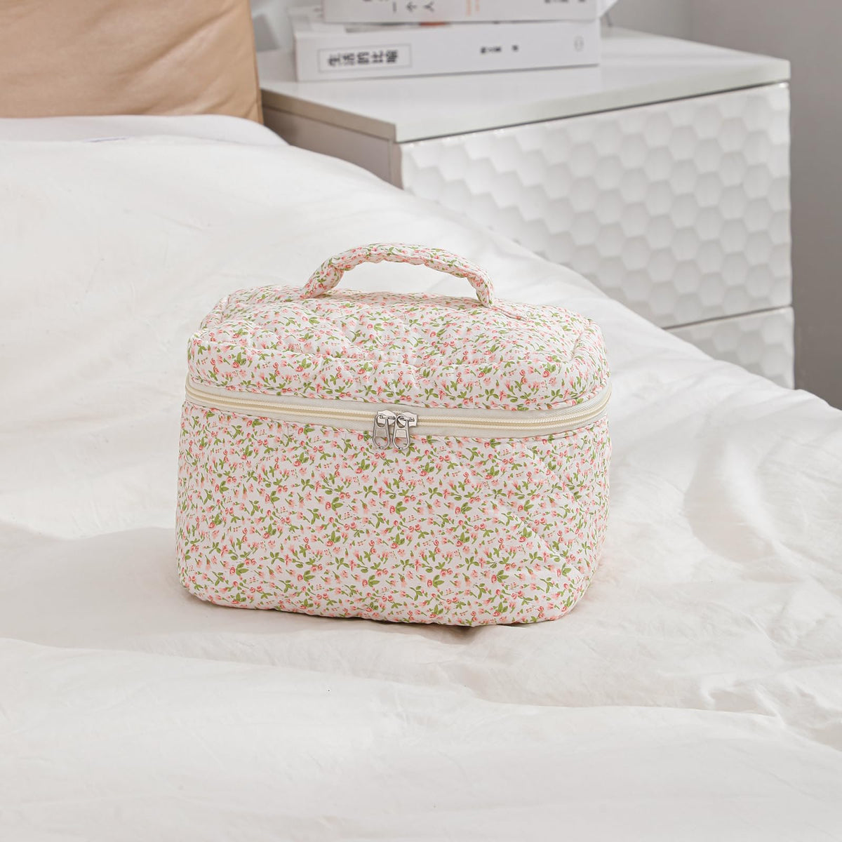 Interior of uekeboag Large Travel Quilted Makeup Bag filled with cosmetics