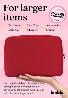 Interior view of Embla Large Makeup Bag with cosmetics