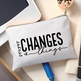 Interior view of HubbgDesign Prayer Changes Things Makeup Bag showing storage space