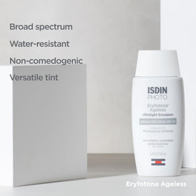 ISDIN Eryfotona Ageless Tinted Mineral Face Sunscreen SPF 50 on a bathroom counter