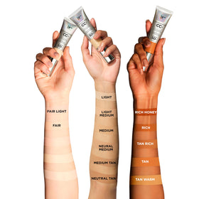 IT Cosmetics CC+ Cream Medium displayed with other makeup products