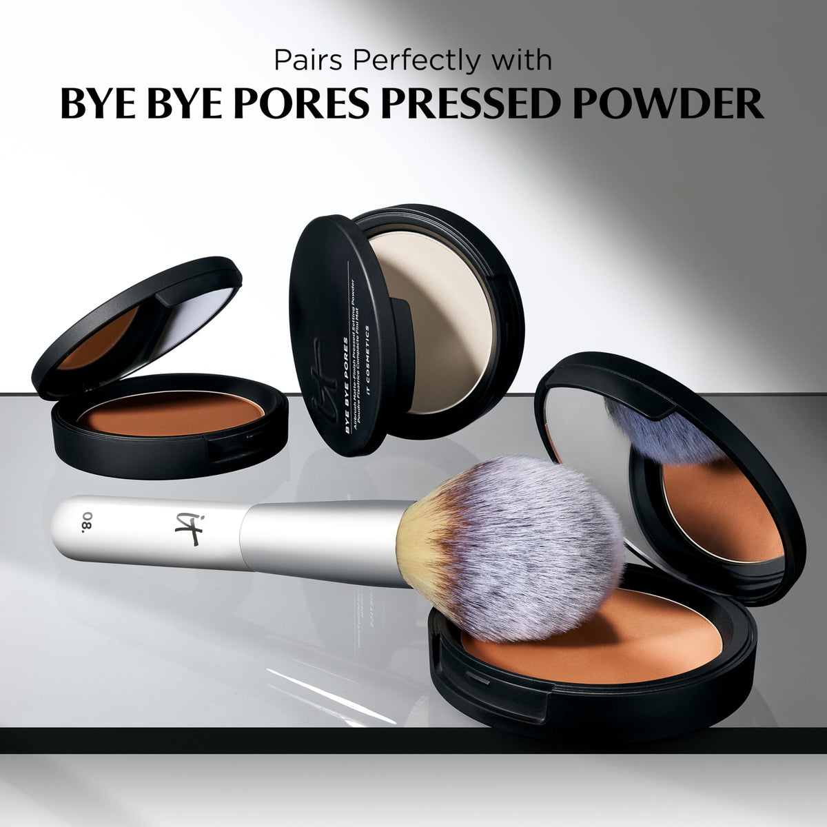 IT Cosmetics Heavenly Luxe Wand Ball Powder Brush #8 with makeup products