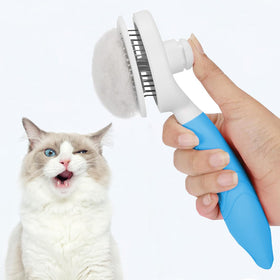 itPlus Self Cleaning Slicker Brush side view showing ergonomic handle