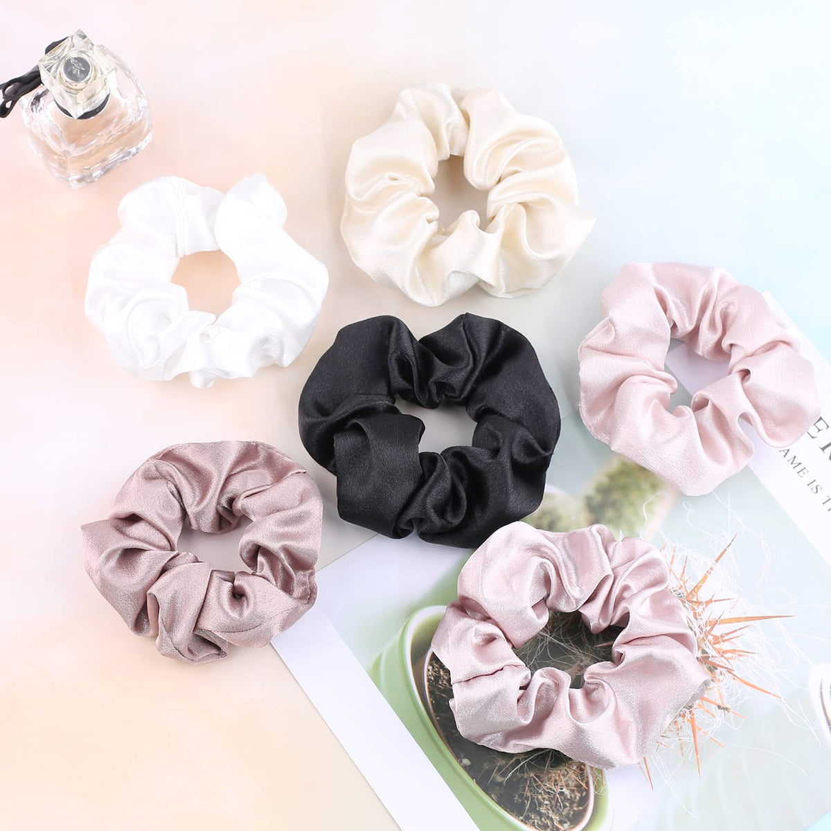 IVARYSS Satin Scrunchies displayed in a stylish arrangement