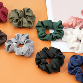 IVARYSS Satin Scrunchies displayed on a wrist