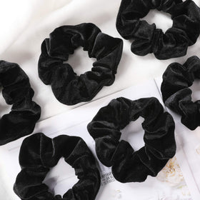 IVARYSS Velvet Scrunchies displayed with hair accessories