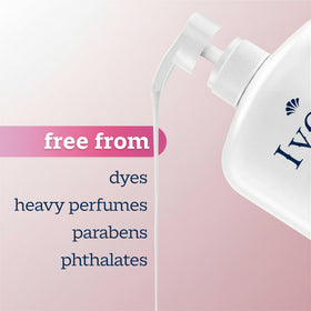 Ivory Body Wash in a bathroom setting with soft towels