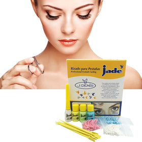 J. Denis eyelash curling tool displayed on a vanity