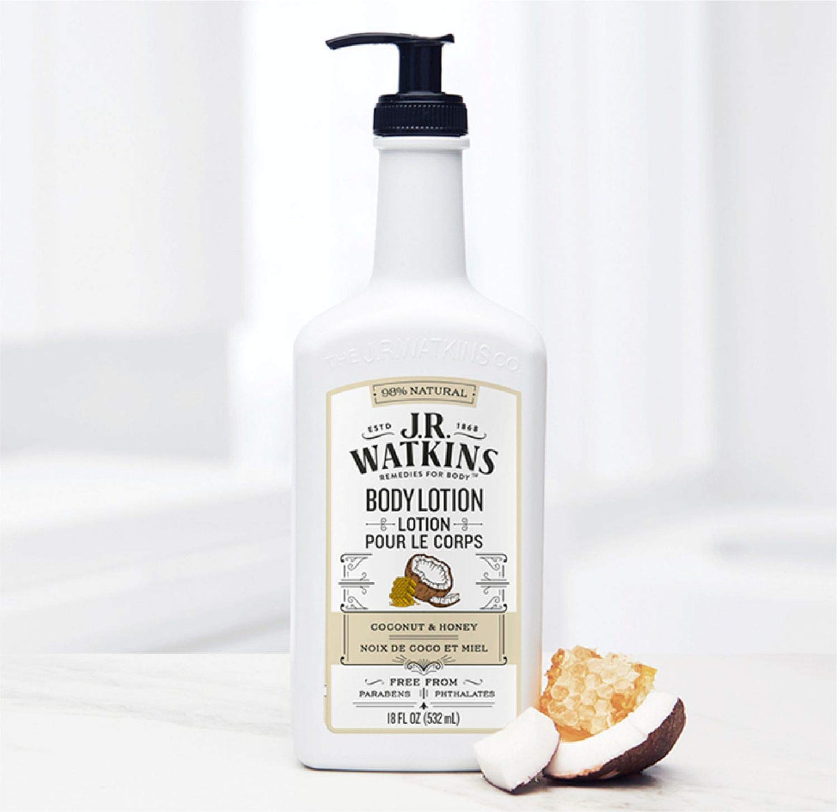 J.R. Watkins Daily Moisturizing Lotion displayed with coconut and honey