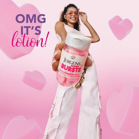 Jergens Cherry Almond Lotion Bursts in hand for easy use