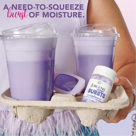 Jergens Lavender Lotion Bursts star shapes on a table