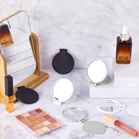 Jetec compact mirrors stacked in a cosmetic bag