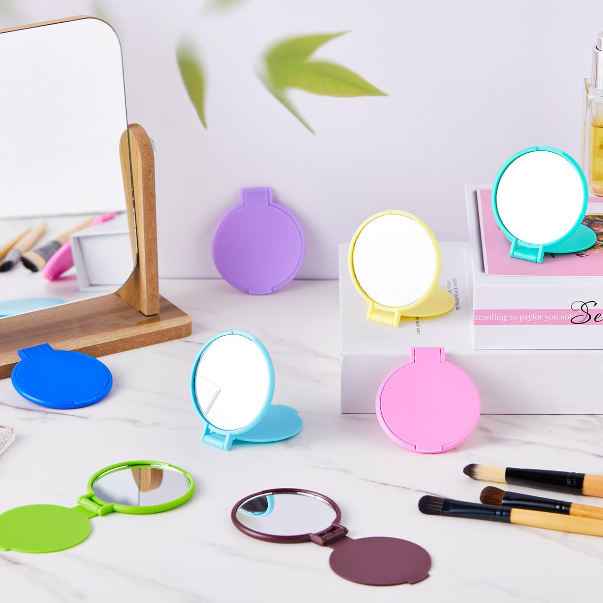 Jetec compact mirrors stacked in a decorative arrangement
